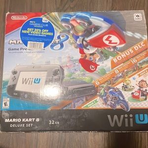 I am selling the Nintendo Wii U Mario Kart 8 Deluxe Bundle 32gb black